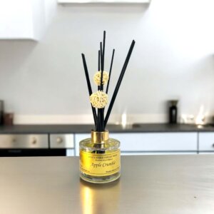 Apple Crumble Reed Diffuser bottle on kitchen counter