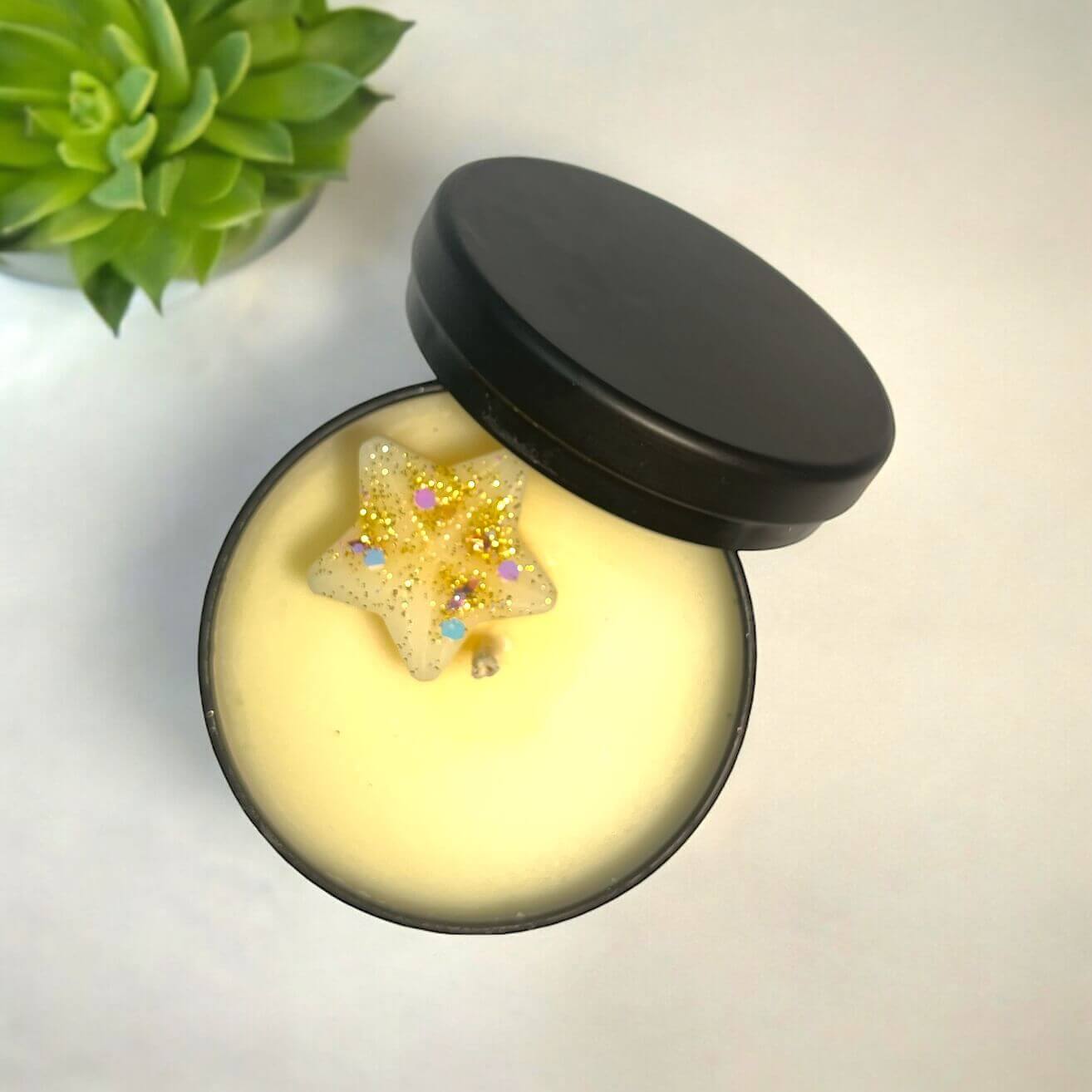 Soy Candle in a 4oz Black Candle Tin top view